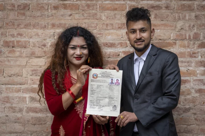 First same-sex married couple in Nepal vow to continue campaign for gay rights